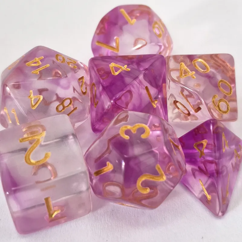 Kit 7 Dados Translúcido Lilás c/ Números Dourados