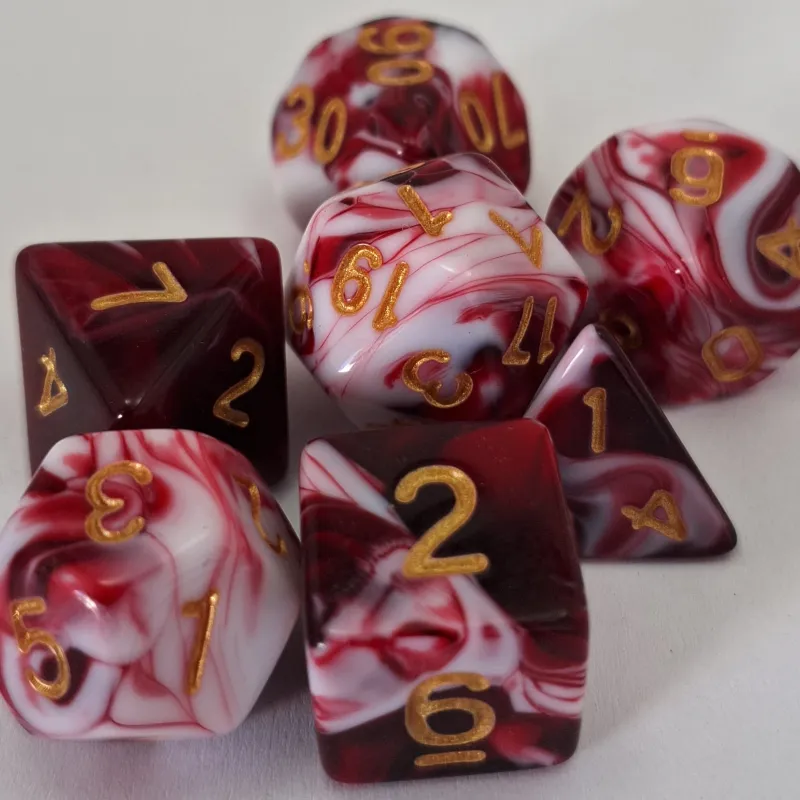 Kit 7 Dados Marmorizados Malhado Vermelho c/ Números Dourados